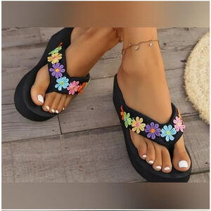 Black Platform Sandals with Festive Embellishments